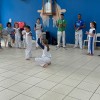 Alunos do Projeto Capoeira escola mostrando um pouco do que trabalharam em aula no Colgio Passionista Santa Maria. - Colgio Passionista Santa Maria
